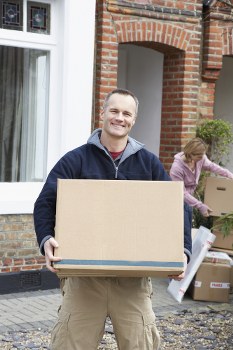House movers loading a family home in Holland Park