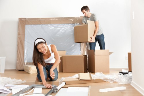 Professional removals team planning a move in Holland Park
