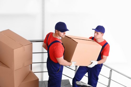 Professional office removals planning in Hollandpark with moving boxes and desks