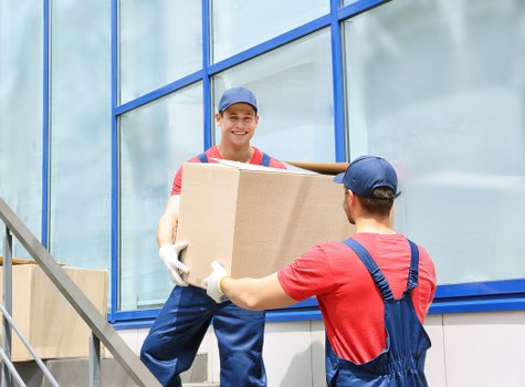 Commercial moving team planning an office relocation in Holland Park