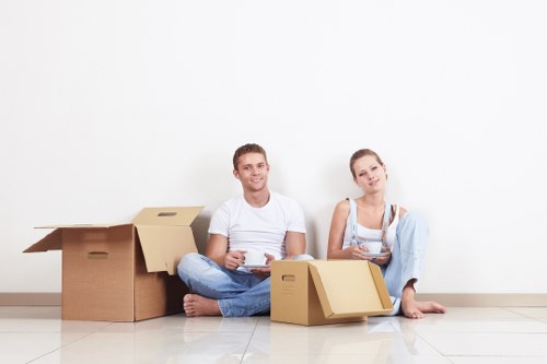 Local moving team loading furniture near Holland Park