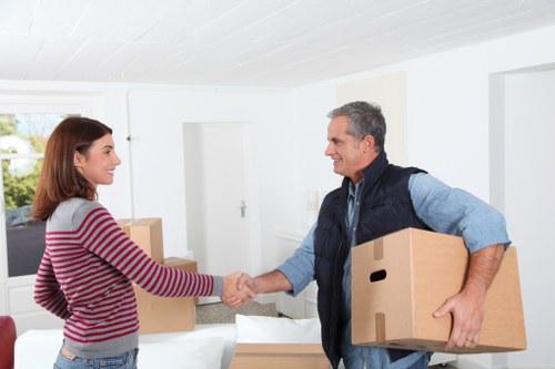 Loading furniture into a van for a Holland Park move