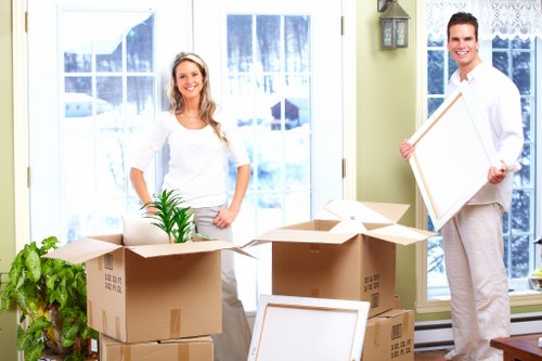 Business relocation team handling office furniture and equipment in Hollandpark
